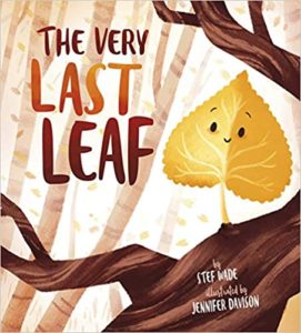 The cover of THE VERY LAST LEAF, a picture book by Stef Wade. In a cute, cartoon style, a smiling orange leaf sits on a tree branch. The cover is done in autumnal shades of red, orange, and brown.